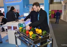 James Moore is demonstrating the Select Master, which can select the best combination of fruit or veg to make the right pack weight. It can be used in a line or as a stand alone unit.